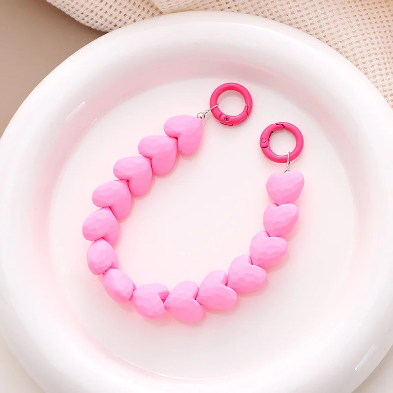 Telefoonkoord roze met hartjes